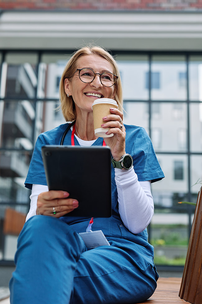 happy nurse using sproutivity reports