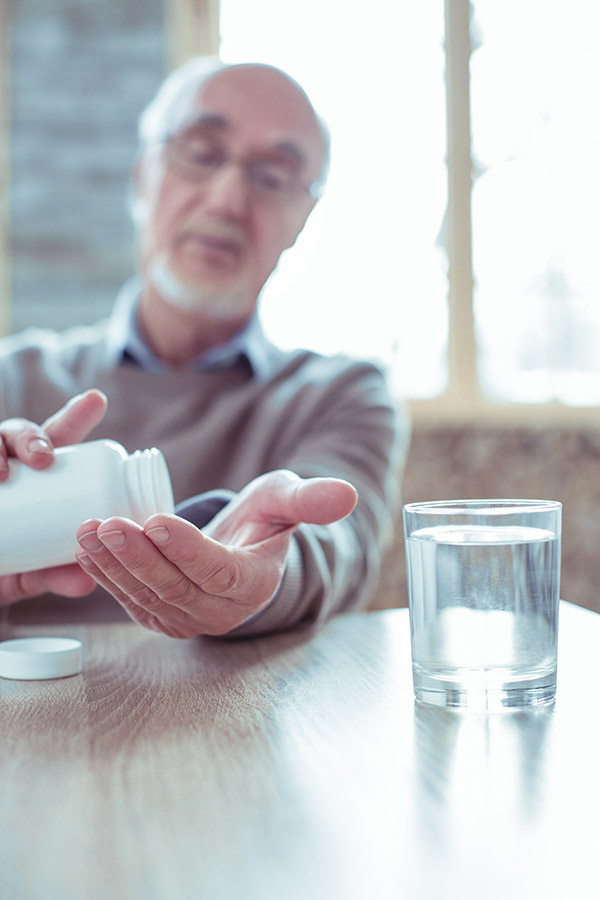 patient alone taking meds